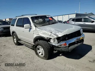 1997 Toyota 4Runner SR5 z VIN JT3GN86R9V0050590, wystawiony jako Copart lot #58183695 z przebiegiem 331 017 mil mil oraz Szkoda całkowita • Salvage title. Historia ofert i sprzedaży dostępna na DreamBid. Obrazek 14.