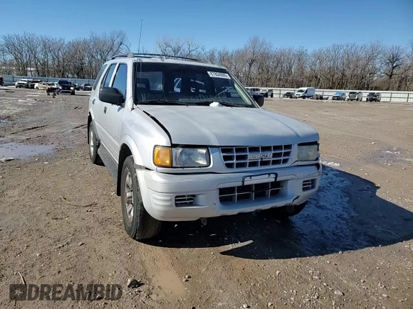1999 Isuzu Rodeo S with VIN 4S2CK58WXX4373485, listed as a Copart auction lot 87804995 with 246,518 mi miles and Salvage title. Bid and sale history available at DreamBid. Image 12.