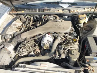 1995 Ford Thunderbird LX with VIN 1FALP62WXSH147871, listed as a IAAI auction lot 41878652 with 95,305 mi miles. Bid and sale history available at carsss.com. Image 10.