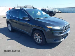 2014 Jeep Cherokee Latitude z VIN 1C4PJMCB0EW224504, wystawiony jako IAAI lot #42047699 z przebiegiem 176 148 mil mil oraz . Historia ofert i sprzedaży dostępna na DreamBid. Obrazek 1.