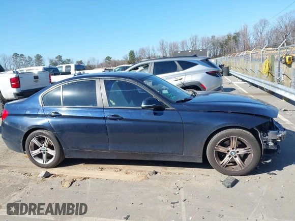 2013 BMW 3 Series 320i with VIN WBA3B1C5XDF461582, listed as a IAAI auction lot 41644855 with 159,363 mi miles. Bid and sale history available at carsss.com. Image 14.