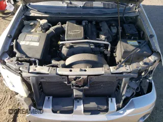 2004 GMC Envoy SLE z VIN 1GKDS13S842182799, wystawiony jako Copart lot #55553774 z przebiegiem 216 710 mil mil oraz Szkoda całkowita • Salvage title. Historia ofert i sprzedaży dostępna na DreamBid. Obrazek 11.