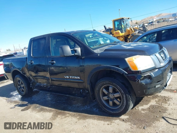 2014 Nissan Titan S with VIN 1N6AA0EC6EN506928, listed as a IAAI auction lot 41380319 with 102,669 mi miles and . Bid and sale history available at DreamBid. Image 13.