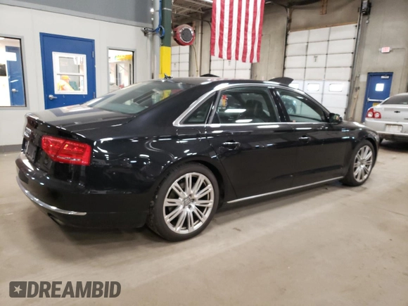 2014 Audi A8 3.0T z VIN WAURGAFD1EN009932, wystawiony jako Copart lot #84607914 z przebiegiem 87 981 mil mil oraz Szkoda całkowita • Salvage title. Historia ofert i sprzedaży dostępna na DreamBid. Obrazek 3.