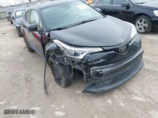 2019 Toyota C-HR XLE with VIN JTNKHMBX2K1029012, listed as a IAAI auction lot 41717454 with 87,040 mi miles. Bid and sale history available at carsss.com. Image 6.