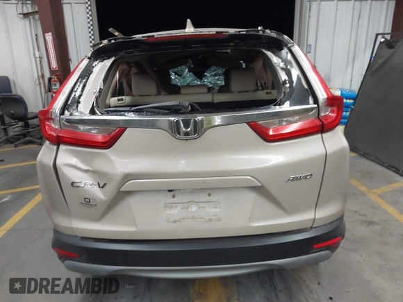 2018 Honda CR-V EX-L z VIN 2HKRW2H89JH671327, wystawiony jako IAAI lot #42159441 z przebiegiem Nie podano mil oraz . Historia ofert i sprzedaży dostępna na DreamBid. Obrazek 15.