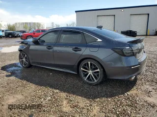 2022 Honda Civic Touring z VIN 2HGFE1F91NH304319, wystawiony jako Copart lot #55896485 z przebiegiem 56 476 mil mil oraz Szkody całkowita. Historia ofert i sprzedaży dostępna na DreamBid. Obrazek 2.