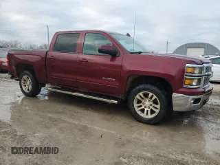 2015 Chevrolet Silverado 1500 LT with VIN 3GCUKREC9FG304810, listed as a Copart auction lot 85220914 with 130,894 mi miles and Salvage Title. Bid and sale history available at DreamBid. Image 4.