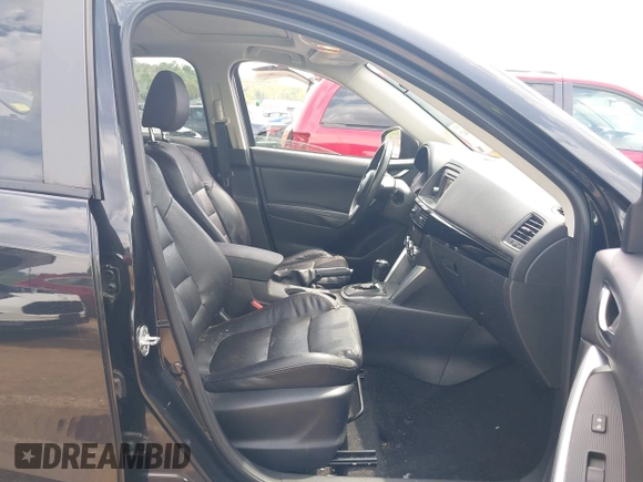 2013 Mazda CX-5 Grand Touring with VIN JM3KE4DE6D0148030, listed as a IAAI auction lot 42082947 with 119,432 mi miles and . Bid and sale history available at DreamBid. Image 5.