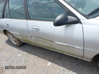 1997 Ford Escort LX z VIN 3FALP15PXVR164048, wystawiony jako IAAI lot #42401563 z przebiegiem 177 024 mil mil oraz . Historia ofert i sprzedaży dostępna na DreamBid. Obrazek 6.