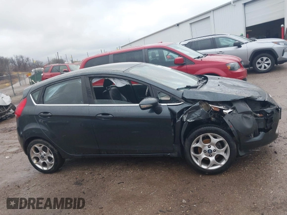 2011 Ford Fiesta SES with VIN 3FADP4FJ7BM111381, listed as a IAAI auction lot 41226251 with 93,694 mi miles. Bid and sale history available at carsss.com. Image 12.