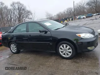 2004 Toyota Camry LE with VIN 4T1BF32K84U074364, listed as a IAAI auction lot 41479264 with 265,865 mi miles. Bid and sale history available at carsss.com. Image 13.
