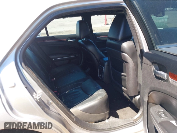 2014 Chrysler 300 with VIN 2C3CCAAG8EH264595, listed as a IAAI auction lot 42076996 with 101,659 mi miles and . Bid and sale history available at DreamBid. Image 8.