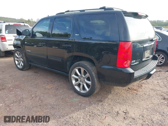 2012 GMC Yukon SLT with VIN 1GKS1CE06CR104447, listed as a IAAI auction lot 41589823 with 183,003 mi miles. Bid and sale history available at carsss.com. Image 3.