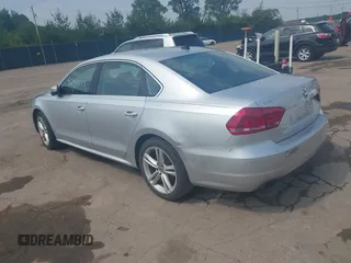 2014 Volkswagen Passat SE with VIN 1VWBT7A37EC039074, listed as a IAAI auction lot 42439583 with 109,654 mi miles and . Bid and sale history available at DreamBid. Image 3.