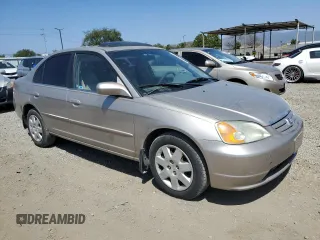 2002 Honda Civic EX with VIN 1HGES26782L025456, listed as a Copart auction lot 54395665 with 191,994 mi miles and Salvage Title. Bid and sale history available at DreamBid. Image 4.