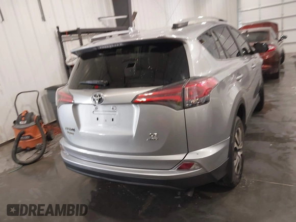 2016 Toyota RAV4 LE with VIN 2T3BFREV7GW450556, listed as a IAAI auction lot 41815720 with 106,734 mi miles. Bid and sale history available at carsss.com. Image 17.