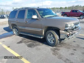 2004 Chevrolet Tahoe LT with VIN 1GNEC13Z24J170834, listed as a IAAI auction lot 41149637 with 362,679 mi miles and . Bid and sale history available at DreamBid. Image 1.