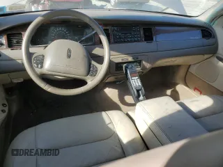 1999 Lincoln Town Car Signature z VIN 1LNHM82W7XY626305, wystawiony jako Copart lot #58009475 z przebiegiem Nie podano mil oraz Szkoda całkowita • Salvage title. Historia ofert i sprzedaży dostępna na DreamBid. Obrazek 8.