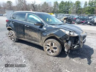 2021 Kia Sportage EX z VIN KNDPNCAC7M7911398, wystawiony jako IAAI lot #42031614 z przebiegiem 43 211 mil mil oraz . Historia ofert i sprzedaży dostępna na DreamBid. Obrazek 1.