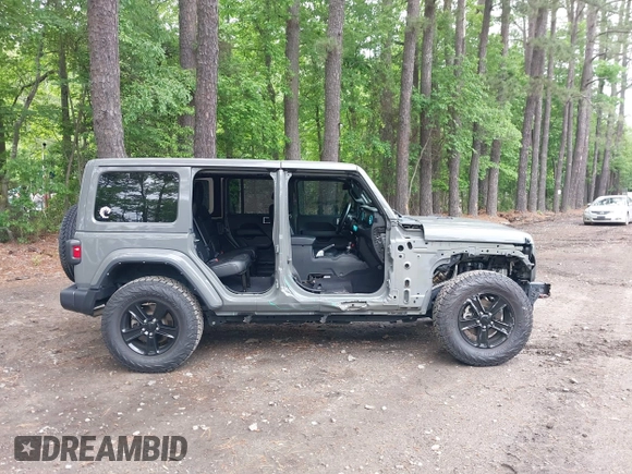2021 Jeep Wrangler Unlimited Sahara with VIN 1C4HJXEG0MW703812, listed as a IAAI auction lot 42186089 with 50,349 mi miles and . Bid and sale history available at DreamBid. Image 14.