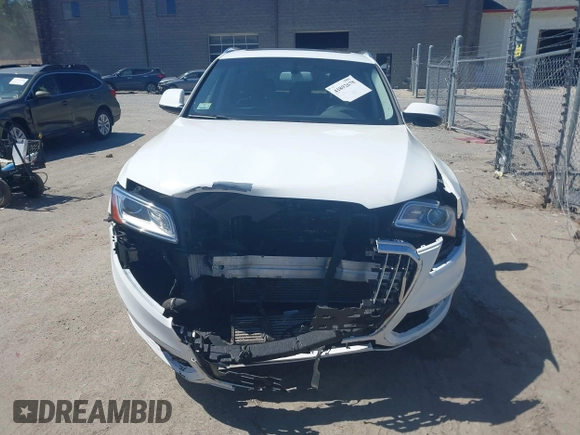 2017 Audi Q5 Premium with VIN WA1C2AFP6HA080664, listed as a IAAI auction lot 41892678 with 162,118 mi miles and . Bid and sale history available at DreamBid. Image 13.