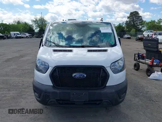2023 Ford Transit Cargo z VIN 1FTBR1Y88PKB28094, wystawiony jako IAAI lot #42206002 z przebiegiem 22 519 mil mil oraz . Historia ofert i sprzedaży dostępna na DreamBid. Obrazek 11.