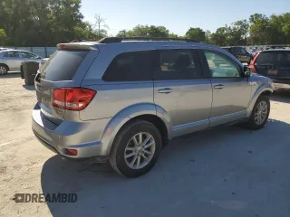 2017 Dodge Journey SXT with VIN 3C4PDCBG2HT521671, listed as a Copart auction lot 52565935 with 116,440 mi miles and Salvage Title. Bid and sale history available at DreamBid. Image 3.