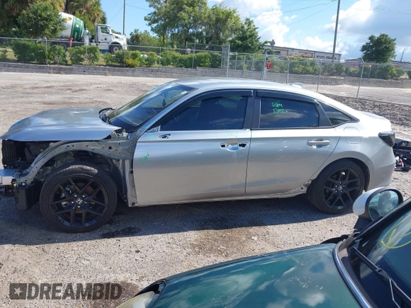 2025 Honda Civic Sport z VIN 2HGFE2F59SH549528, wystawiony jako IAAI lot #42232674 z przebiegiem 8 889 mil mil oraz . Historia ofert i sprzedaży dostępna na DreamBid. Obrazek 14.