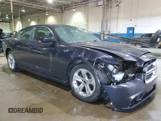 2012 Dodge Charger SXT with VIN 2C3CDXHG6CH129182, listed as a Copart auction lot 50692555 with 234,225 mi miles and Clean Title. Bid and sale history available at DreamBid. Image 4.