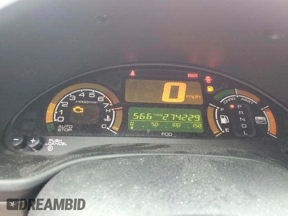 2005 Honda Insight z VIN JHMZE14715S000332, wystawiony jako Copart lot #56385575 z przebiegiem 274 229 mil mil oraz Szkoda całkowita • Salvage title. Historia ofert i sprzedaży dostępna na DreamBid. Obrazek 9.