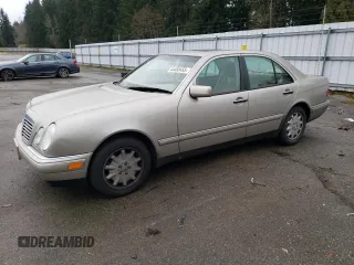 1999 Mercedes-Benz E-Class with VIN WDBJF82H2XX015586, listed as a Copart auction lot 44465455 with 76,890 mi miles and Salvage Title. Bid and sale history available at carsss.com. Image 1.