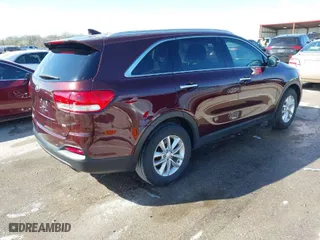 2016 Kia Sorento LX with VIN 5XYPG4A3XGG133119, listed as a IAAI auction lot 41844749 with 68,957 mi miles. Bid and sale history available at carsss.com. Image 4.