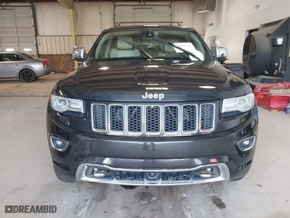 2014 Jeep Grand Cherokee Overland with VIN 1C4RJFCM4EC386398, listed as a IAAI auction lot 41696113 with 119,110 mi miles. Bid and sale history available at carsss.com. Image 6.
