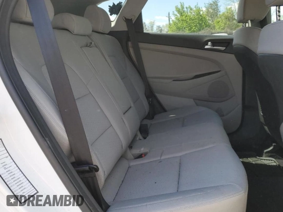 2020 Hyundai Tucson SE z VIN KM8J2CA43LU133054, wystawiony jako Copart lot #53055085 z przebiegiem 57 529 mil mil oraz Szkoda całkowita • Salvage title. Historia ofert i sprzedaży dostępna na DreamBid. Obrazek 11.