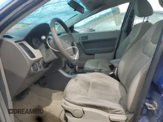 2009 Ford Focus SE with VIN 1FAHP35N69W229657, listed as a Copart auction lot 49583665 with 132,459 mi miles and Salvage Title. Bid and sale history available at carsss.com. Image 7.