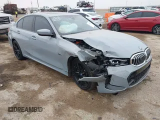 2023 BMW 3 Series 330e with VIN 3MW39FF00P8D57706, listed as a IAAI auction lot 41560259 with 1 mi miles. Bid and sale history available at carsss.com. Image 1.