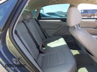 2013 Volkswagen Passat SE w/Sunroof & Nav with VIN 1VWBP7A35DC148149, listed as a IAAI auction lot 42148096 with 228,555 mi miles. Bid and sale history available at carsss.com. Image 8.