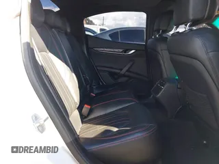 2015 Maserati Ghibli z VIN ZAM57XSA8F1161212, wystawiony jako IAAI lot #41746084 z przebiegiem 57 169 mil mil oraz . Historia ofert i sprzedaży dostępna na DreamBid. Obrazek 8.
