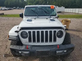 2020 Jeep Gladiator Rubicon с VIN 1C6JJTBG6LL102474, выставлен на аукционе Copart как лот 60377785 с пробегом 56 422 миль миль и Списание • Salvage title. История ставок и продаж доступна на DreamBid. Изображение 5.