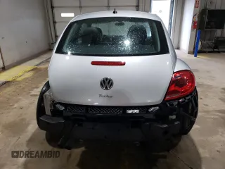 2016 Volkswagen Beetle Wolfsburg Edition with VIN 3VWF17AT3GM602307, listed as a Copart auction lot 56144965 with 63,317 mi miles and Salvage Title. Bid and sale history available at DreamBid. Image 6.