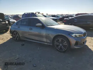 2023 BMW 3 Series 330e xDrive with VIN 3MW39FS07P8D00974, listed as a Copart auction lot 84912304 with 18,879 mi miles and Salvage Title. Bid and sale history available at carsss.com. Image 4.