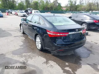 2014 Toyota Avalon Limited with VIN 4T1BK1EB5EU129821, listed as a IAAI auction lot 42085414 with 113,729 mi miles. Bid and sale history available at carsss.com. Image 3.