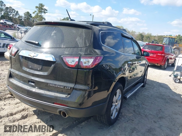 2016 Chevrolet Traverse LTZ with VIN 1GNKVJKD1GJ221893, listed as a IAAI auction lot 41913000 with 112,900 mi miles and . Bid and sale history available at DreamBid. Image 4.