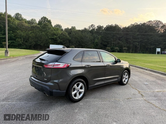 2020 Ford Edge SE с VIN 2FMPK3G9XLBB11099, выставлен на аукционе Copart как лот 66417805 с пробегом 119 223 миль миль и Чистый • Clean title. История ставок и продаж доступна на DreamBid. Изображение 4.