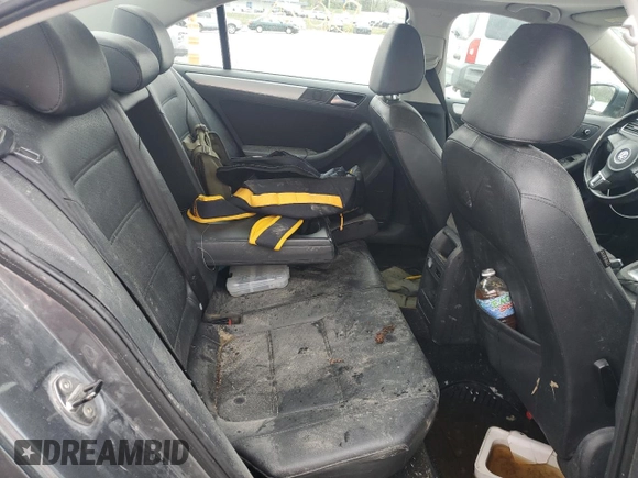 2013 Volkswagen Jetta SE с VIN 3VWDX7AJ5DM311890, выставлен на аукционе Copart как лот 50812155 с пробегом Не указан миль и Списание • Salvage title. История ставок и продаж доступна на DreamBid. Изображение 10.