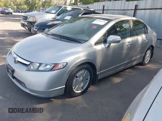 2007 Honda Civic with VIN JHMFA36217S004850, listed as a IAAI auction lot 42544238 with 143,861 mi miles and . Bid and sale history available at DreamBid. Image 2.