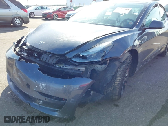 2021 Tesla Model 3 Performance with VIN 5YJ3E1EC3MF082532, listed as a IAAI auction lot 41757905 with 60,431 mi miles and . Bid and sale history available at DreamBid. Image 6.