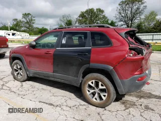 2014 Jeep Cherokee Trailhawk z VIN 1C4PJMBS2EW100476, wystawiony jako Copart lot #55130035 z przebiegiem 136 943 mil mil oraz Szkoda całkowita • Salvage title. Historia ofert i sprzedaży dostępna na DreamBid. Obrazek 2.