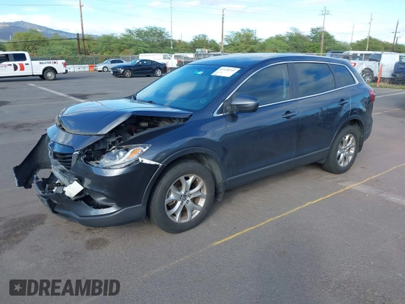 2014 Mazda CX-9 Sport with VIN JM3TB3BAXE0442006, listed as a IAAI auction lot 41430742 with 82,682 mi miles and . Bid and sale history available at DreamBid. Image 17.